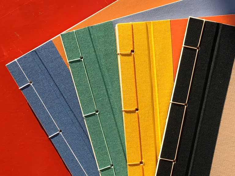 A collection of photo booklets in japanese binding technique